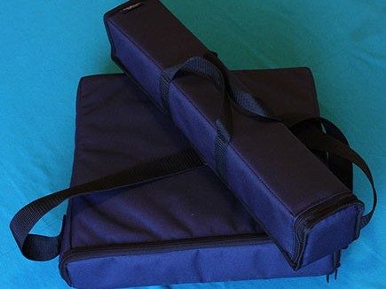 Two Acutonics planetary hand chime carrying cases